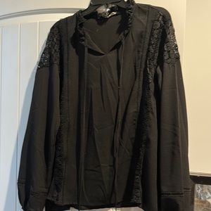 Black blouse with small cutouts